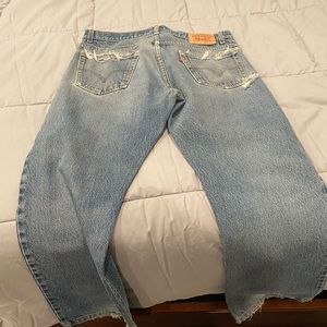 Washed Levi jeans with rips